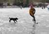 Skaters Enjoy Frozen Glasgow Pond During Lingering Cold Spell skaters-enjoy-frozen-glasgow-pond-during-lingering-cold-spell