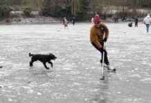 Skaters Enjoy Frozen Glasgow Pond During Lingering Cold Spell skaters-enjoy-frozen-glasgow-pond-during-lingering-cold-spell